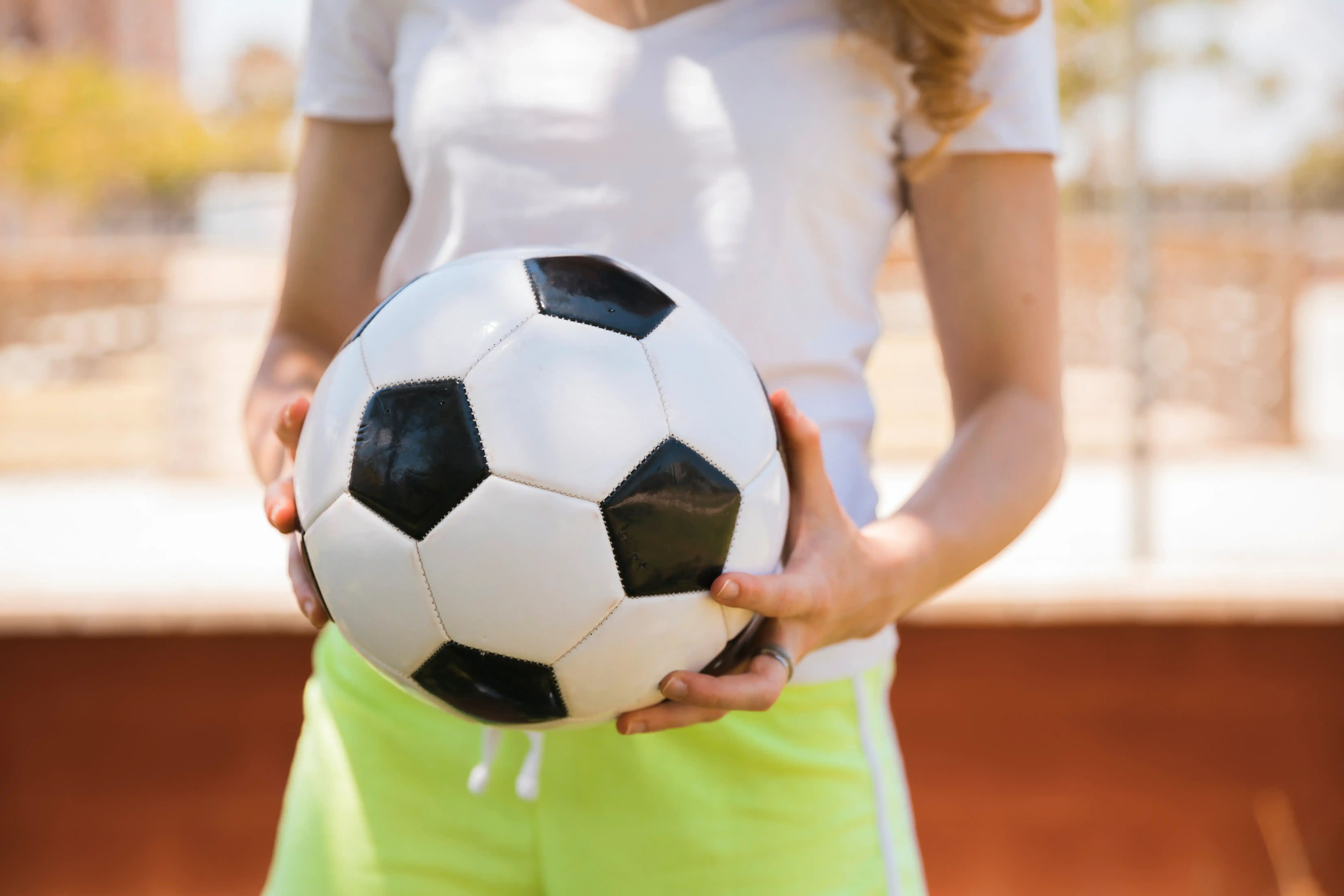 plays football